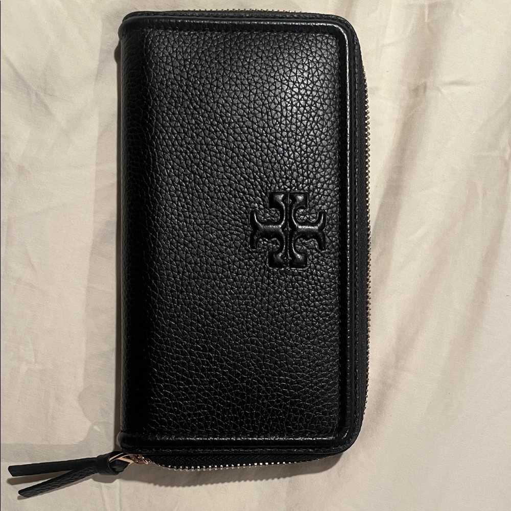 Tory Burch black wallet. Never used.
